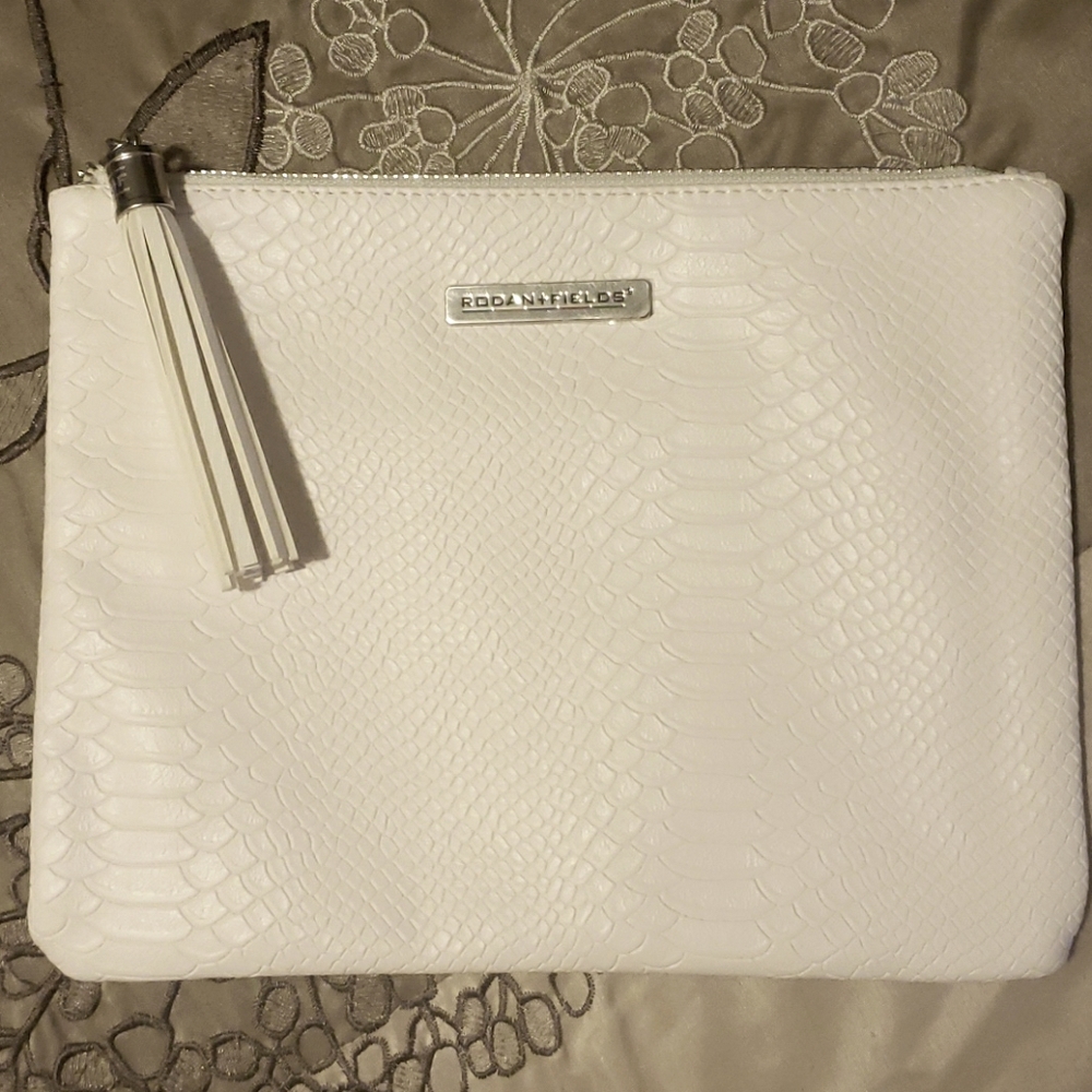Rodan+Fields White Zip Clutch